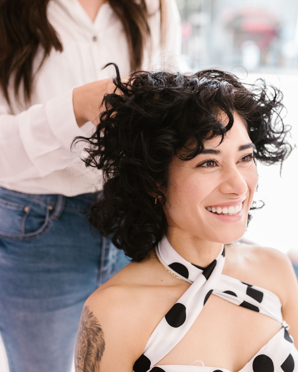 A smiling client after her appointment